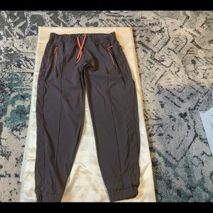 Columbia Pants Size XL Grey with peach string and zippers.. excellent condition.